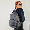 womens black leather backpack for work, travel and modern parenting 