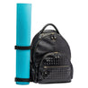 pair of black yoga mat clips attached to joy xl black covered stud leather ladies backpack